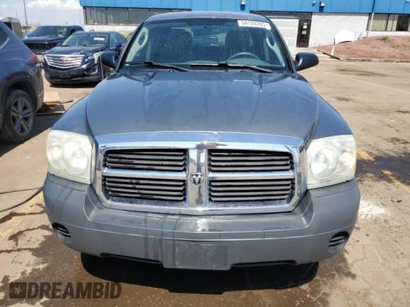 2005 Dodge Dakota ST с VIN 1D7HE28K05S223999, выставлен на аукционе Copart как лот 54133785 с пробегом 212 687 миль миль и Чистый • Clean title. История ставок и продаж доступна на DreamBid. Изображение 5.