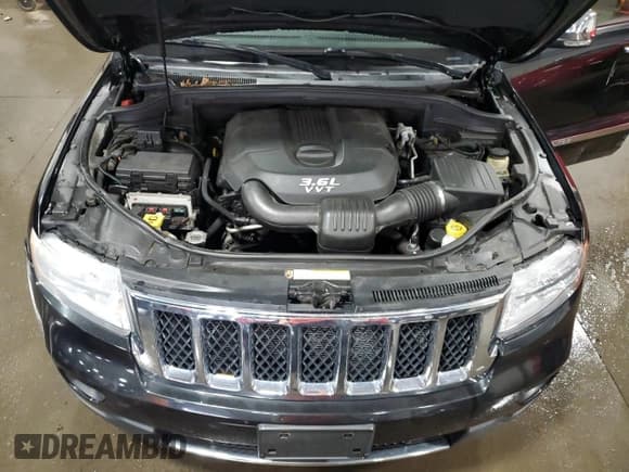 ✅ 2012 Jeep Grand Cherokee Overland • VIN: 1C4RJFCG0CC200346 • Lot: 85882075. Listed on Copart with 161,948 mi. Free auction sales archive from the USA and detailed vehicle history report at DreamBid. Image 12.