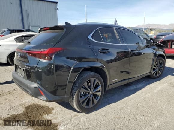 ✅ 2022 Lexus UX 250h F Sport • VIN: JTHE9JBH8N2055567 • Лот: 80708554. Опубликован ранее на Copart с пробегом 34 161 миль. Бесплатный доступ к архиву аукционных продаж из США и подробный отчёт об истории автомобиля на DreamBid. Изображение 3.