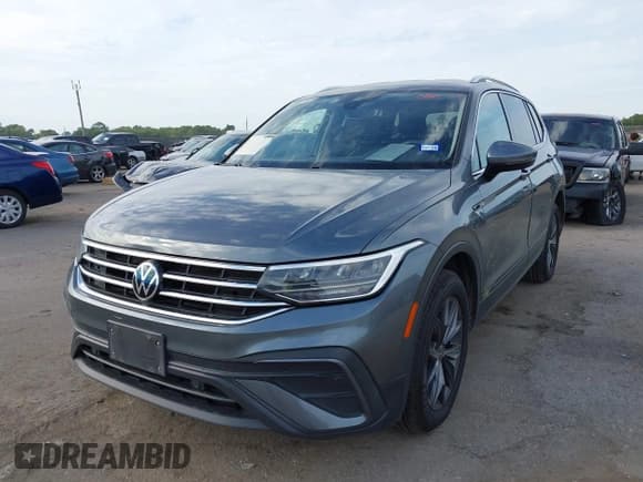 ✅ 2022 Volkswagen Tiguan SE • VIN: 3VV3B7AX5NM059997 • Лот: 43334942. Опубликован ранее на IAAI с пробегом 79 417 миль. Бесплатный доступ к архиву аукционных продаж из США и подробный отчёт об истории автомобиля на DreamBid. Изображение 2.