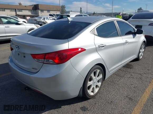 ✅ 2013 Hyundai Elantra GLS • VIN: KMHDH4AE5DU918428 • Lot: 43577973. Listed on IAAI with 116,708 mi. Free auction sales archive from the USA and detailed vehicle history report at DreamBid. Image 4.