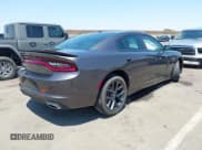 ✅ 2022 Dodge Charger SXT • VIN: 2C3CDXBG3NH192929 • Lot: 42713432. Wystawiony na IAAI z przebiegiem 29 792 mil. Bezpłatny archiwum sprzedaży aukcyjnych z USA i szczegółowy raport historii pojazdu na DreamBid. Zdjęcie 4.