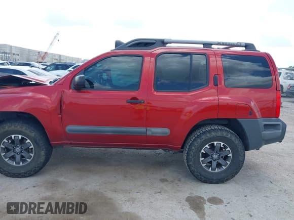 ✅ 2015 Nissan Xterra Pro-4X • VIN: 5N1AN0NW7FN653743 • Lot: 42553625. Wystawiony na IAAI z przebiegiem 125 682 mil. Bezpłatny archiwum sprzedaży aukcyjnych z USA i szczegółowy raport historii pojazdu na DreamBid. Zdjęcie 14.