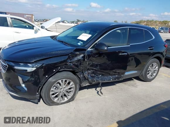 ✅ 2023 Buick Envision Preferred • VIN: LRBAZLR47PD032205 • Lot: 43549973. Listed on IAAI with 21,893 mi. Free auction sales archive from the USA and detailed vehicle history report at DreamBid. Image 14.