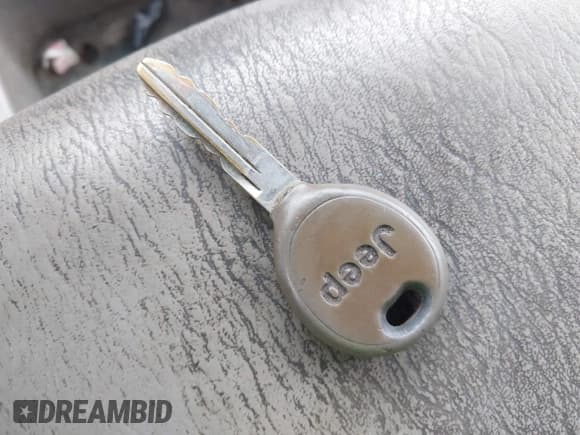 ✅ 1999 Jeep Grand Cherokee Laredo • VIN: 1J4G258S2XC768349 • Lot: 41305102. Listed on IAAI with 136,848 mi. Free auction sales archive from the USA and detailed vehicle history report at DreamBid. Image 11.