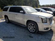 ✅ 2015 GMC Yukon XL Denali • VIN: 1GKS1JKJ1FR304951 • Lot: 81426245. Listed on Copart with 256,727 mi. Free auction sales archive from the USA and detailed vehicle history report at DreamBid. Image 4.