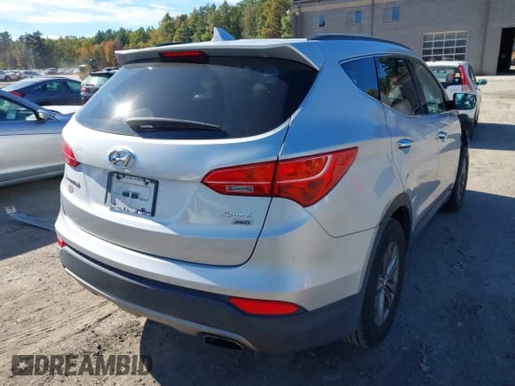 ✅ 2014 Hyundai Santa Fe • VIN: 5XYZUDLB5EG127411 • Lot: 43442706. Listed on IAAI with 68,022 mi. Free auction sales archive from the USA and detailed vehicle history report at DreamBid. Image 4.