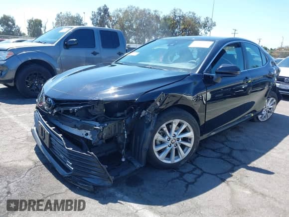 2022 Toyota Camry LE с VIN 4T1C11AK1NU668224, выставлен на аукционе IAAI как лот 43141098 с пробегом 52 675 миль миль и . История ставок и продаж доступна на DreamBid. Изображение 18.