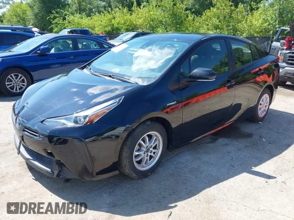 ✅ 2022 Toyota Prius L Eco • VIN: JTDKAMFU4N3184081 • Lot: 42862684. Listed on IAAI with 40,576 mi. Free auction sales archive from the USA and detailed vehicle history report at DreamBid. Image 2.