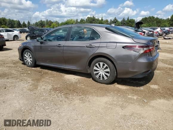 2021 Toyota Camry Hybrid LE with VIN 4T1C31AK4MU567560, listed as a Copart auction lot 70714425 with 185,505 mi miles and Salvage title. Bid and sale history available at DreamBid. Image 2.