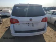 ✅ 2014 Volkswagen Routan SE • VIN: 2C4RVABG7ER135241 • Лот: 71055144. Опубликован ранее на Copart с пробегом 186 341 миль. Бесплатный доступ к архиву аукционных продаж из США и подробный отчёт об истории автомобиля на DreamBid. Изображение 6.