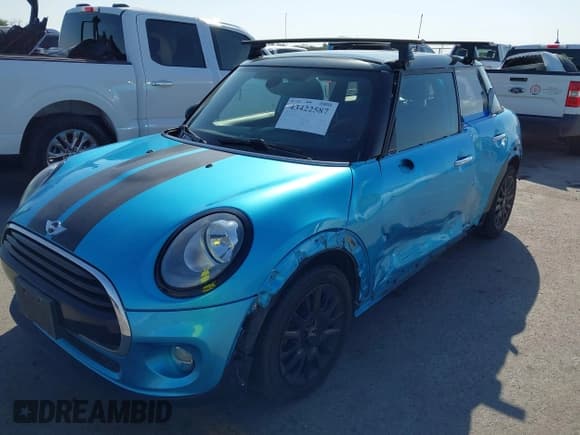 ✅ 2017 MINI Hardtop 4 Door Cooper • VIN: WMWXU1C39H2F77401 • Лот: 43422587. Опубликован ранее на IAAI с пробегом 82 034 миль. Бесплатный доступ к архиву аукционных продаж из США и подробный отчёт об истории автомобиля на DreamBid. Изображение 18.