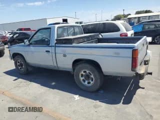 ✅ 1987 Nissan Hardbody E • VIN: JN6ND11S1HW030629 • Lot: 65657004. Wystawiony na Copart z przebiegiem 181 228 mil. Bezpłatny archiwum sprzedaży aukcyjnych z USA i szczegółowy raport historii pojazdu na DreamBid. Zdjęcie 2.
