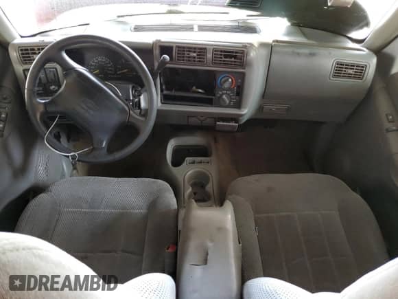 1995 Chevrolet Blazer z VIN 1GNCS13W8S2238495, wystawiony jako Copart lot #74829034 z przebiegiem 199 884 mil mil oraz Szkoda całkowita • Salvage title. Historia ofert i sprzedaży dostępna na DreamBid. Obrazek 8.