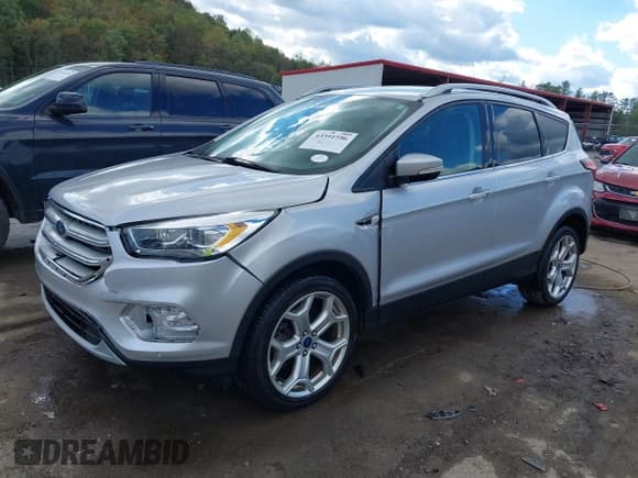 ✅ 2019 Ford Escape Titanium • VIN: 1FMCU9J9XKUB76466 • Lot: 43391596. Listed on IAAI with 65,684 mi. Free auction sales archive from the USA and detailed vehicle history report at DreamBid. Image 17.
