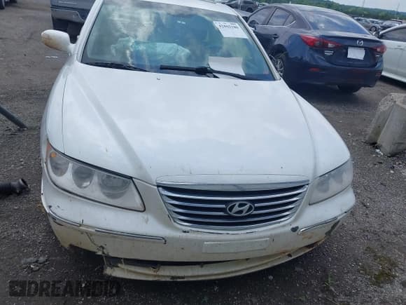 ✅ 2009 Hyundai Azera Limited • VIN: KMHFC46F79A358185 • Lot: 42502180. Listed on IAAI with 176,983 mi. Free auction sales archive from the USA and detailed vehicle history report at DreamBid. Image 12.