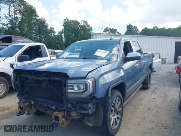 ✅ 2016 GMC Sierra 1500 Denali • VIN: 3GTP1PEC7GG118494 • Lot: 42567049. Listed on IAAI with 163,429 mi. Free auction sales archive from the USA and detailed vehicle history report at DreamBid. Image 2.