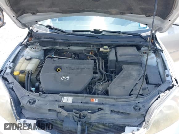 ✅ 2007 Mazda 3 S Grand Touring • VIN: JM1BK343X71640858 • Лот: 42338492. Опубликован ранее на IAAI с пробегом 125 279 миль. Бесплатный доступ к архиву аукционных продаж из США и подробный отчёт об истории автомобиля на DreamBid. Изображение 10.