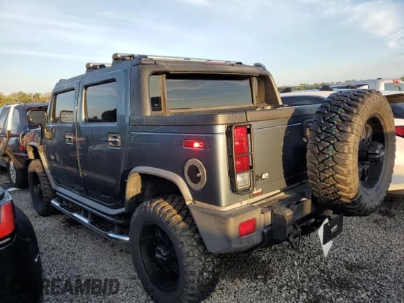 ✅ 2005 Hummer H2 SUT • VIN: 5GRGN22U15H125141 • Lot: 74180754. Listed on Copart with Not provided. Free auction sales archive from the USA and detailed vehicle history report at DreamBid. Image 2.