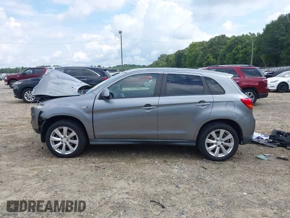 2013 Mitsubishi Outlander ES z VIN 4A4AP3AUXDE020860, wystawiony jako IAAI lot #43064158 z przebiegiem 162 134 mil mil oraz . Historia ofert i sprzedaży dostępna na DreamBid. Obrazek 15.