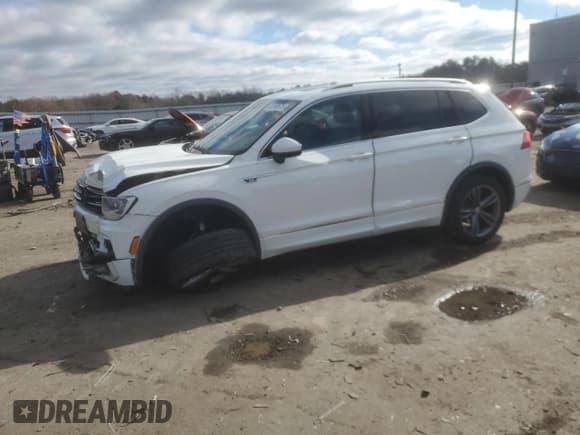 ✅ 2018 Volkswagen Tiguan SEL • VIN: 3VV3B7AX1JM149934 • Lot: 92750675. Listed on Copart with 103,636 mi. Free auction sales archive from the USA and detailed vehicle history report at DreamBid. Image 1.