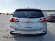 ✅ 2020 Chevrolet Equinox Premier • VIN: 2GNAXNEV4L6163187 • Lot: 81802995. Wystawiony na Copart z przebiegiem 57 892 mil. Bezpłatny archiwum sprzedaży aukcyjnych z USA i szczegółowy raport historii pojazdu na DreamBid. Zdjęcie 6.