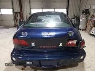 ✅ 2002 Pontiac Sunfire SE • VIN: 1G2JB52F527218348 • Лот: 43550735. Опубликован ранее на Copart с пробегом Не указан. Бесплатный доступ к архиву аукционных продаж из США и подробный отчёт об истории автомобиля на DreamBid. Изображение 6.