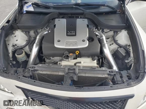 ✅ 2015 Infiniti Q40 • VIN: JN1CV6AP6FM500438 • Лот: 74081644. Опубликован ранее на Copart с пробегом 93 365 миль. Бесплатный доступ к архиву аукционных продаж из США и подробный отчёт об истории автомобиля на DreamBid. Изображение 13.