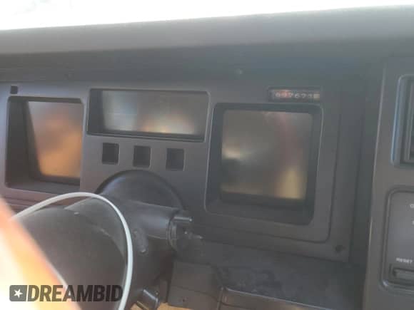 1986 Chevrolet Corvette with VIN 1G1YY0789G5118657, listed as a Copart auction lot 77743794 with 97,673 mi miles and Salvage title. Bid and sale history available at DreamBid. Image 9.