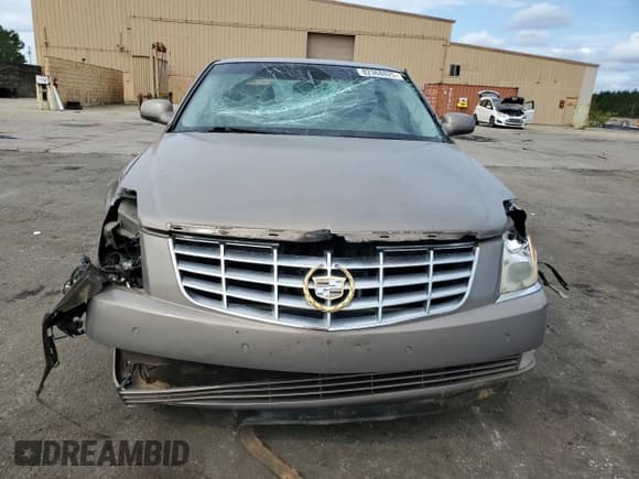 ✅ 2006 Cadillac DTS 1SC • VIN: 1G6KD57Y36U227841 • Lot: 82368825. Listed on Copart with 106,529 mi. Free auction sales archive from the USA and detailed vehicle history report at DreamBid. Image 5.