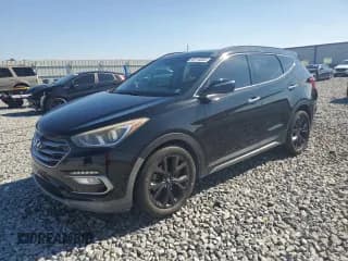 ✅ 2017 Hyundai Santa Fe Ultimate • VIN: 5XYZWDLA7HG502303 • Lot: 93115355. Listed on Copart with 100,217 mi. Free auction sales archive from the USA and detailed vehicle history report at DreamBid. Image 1.