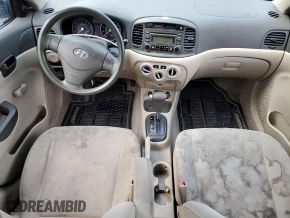 2006 Hyundai Accent GLS with VIN KMHCN46C56U004971, listed as a Copart auction lot 77301034 with 229,170 mi miles and Salvage title. Bid and sale history available at DreamBid. Image 8.