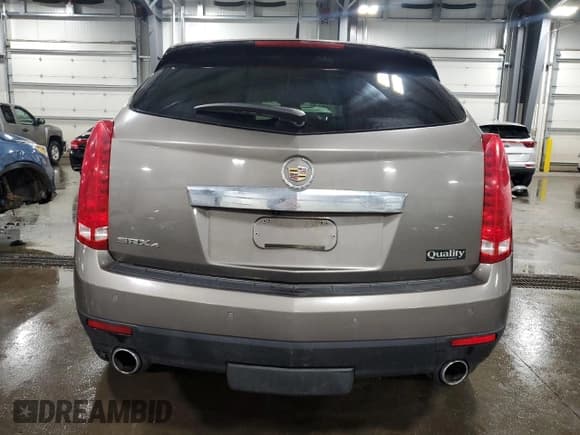 ✅ 2011 Cadillac SRX Premium Collection • VIN: 3GYFNFEY2BS612588 • Lot: 63244825. Listed on Copart with 138,899 mi. Free auction sales archive from the USA and detailed vehicle history report at DreamBid. Image 6.