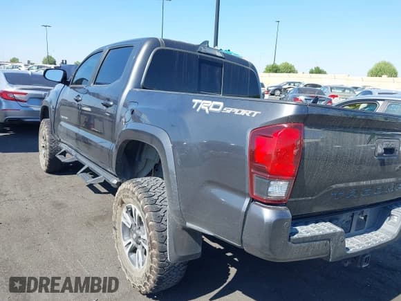 ✅ 2018 Toyota Tacoma TRD Sport • VIN: 3TMAZ5CN7JM066896 • Lot: 43401548. Listed on IAAI with 138,800 mi. Free auction sales archive from the USA and detailed vehicle history report at DreamBid. Image 3.