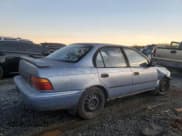 ✅ 1995 Toyota Corolla DX • VIN: JT2AE09B8S0101020 • Lot: 80490114. Listed on Copart with Not provided. Free auction sales archive from the USA and detailed vehicle history report at DreamBid. Image 3.