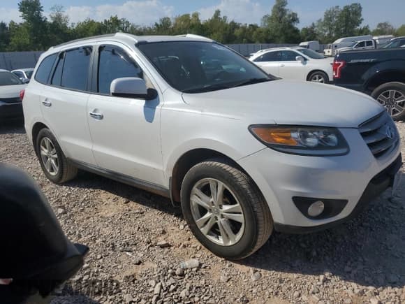 ✅ 2012 Hyundai Santa Fe Limited • VIN: 5XYZK4AG4CG136330 • Lot: 74472644. Listed on Copart with 99,014 mi. Free auction sales archive from the USA and detailed vehicle history report at DreamBid. Image 4.