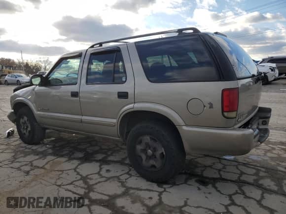 2004 Chevrolet Blazer LS z VIN 1GNDT13X54K134480, wystawiony jako Copart lot #82024914 z przebiegiem 219 210 mil mil oraz Szkoda całkowita • Salvage title. Historia ofert i sprzedaży dostępna na DreamBid. Obrazek 2.