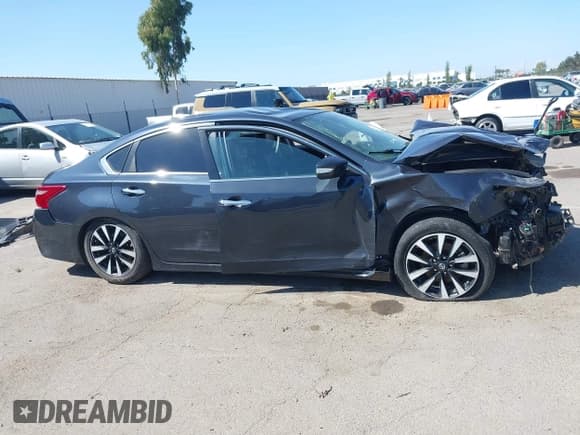 ✅ 2018 Nissan Altima SV • VIN: 1N4AL3AP7JC180902 • Лот: 43133703. Опубликован ранее на IAAI с пробегом Не указан. Бесплатный доступ к архиву аукционных продаж из США и подробный отчёт об истории автомобиля на DreamBid. Изображение 14.