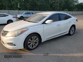 ✅ 2012 Hyundai Azera • VIN: KMHFG4JG1CA136785 • Лот: 67392545. Опубликован ранее на Copart с пробегом 165 478 миль. Бесплатный доступ к архиву аукционных продаж из США и подробный отчёт об истории автомобиля на DreamBid. Изображение 1.