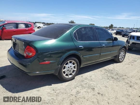 ✅ 2001 Nissan Maxima GXE • VIN: JN1CA31D41T606921 • Лот: 66935545. Опубликован ранее на Copart с пробегом 231 390 миль. Бесплатный доступ к архиву аукционных продаж из США и подробный отчёт об истории автомобиля на DreamBid. Изображение 3.