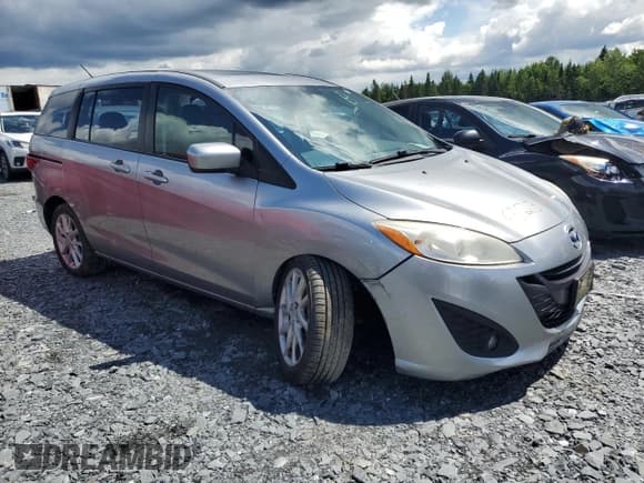 ✅ 2012 Mazda 5 Grand Touring • VIN: JM1CW2DL9C0135669 • Lot: 65231245. Listed on Copart with 215,165 mi. Free auction sales archive from the USA and detailed vehicle history report at DreamBid. Image 4.