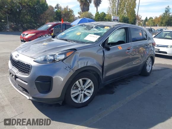 ✅ 2018 Kia Sportage LX • VIN: KNDPM3AC9J7335781 • Lot: 43625671. Listed on IAAI with 77,352 mi. Free auction sales archive from the USA and detailed vehicle history report at DreamBid. Image 2.