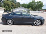 ✅ 2015 Lincoln MKZ • VIN: 3LN6L2G94FR625555 • Lot: 43052508. Listed on IAAI with 103,338 mi. Free auction sales archive from the USA and detailed vehicle history report at DreamBid. Image 13.