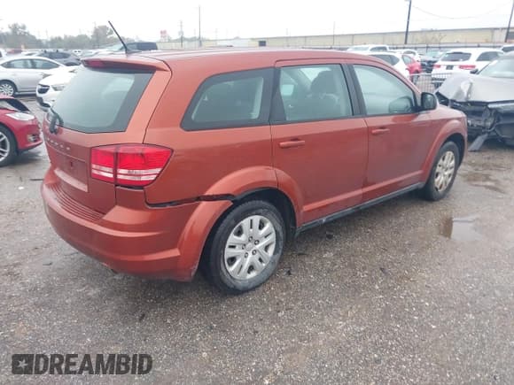 ✅ 2014 Dodge Journey SE • VIN: 3C4PDCAB7ET166272 • Lot: 43810244. Listed on IAAI with 305,153 mi. Free auction sales archive from the USA and detailed vehicle history report at DreamBid. Image 4.