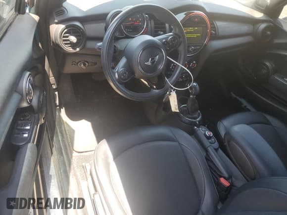 ✅ 2017 MINI Convertible Cooper • VIN: WMWWG5C34H3C99155 • Lot: 58379535. Listed on Copart with 36,116 mi. Free auction sales archive from the USA and detailed vehicle history report at DreamBid. Image 8.