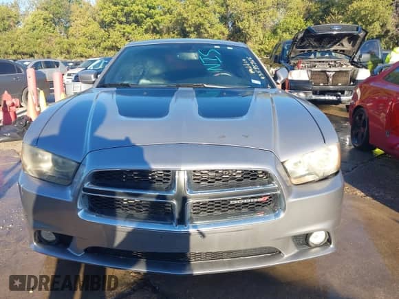 2014 Dodge Charger SXT with VIN 2C3CDXHG2EH239214, listed as a IAAI auction lot 43595966 with 219,931 mi miles and . Bid and sale history available at DreamBid. Image 12.