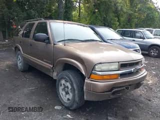 2003 Chevrolet Blazer LS z VIN 1GNDT13X13K134314, wystawiony jako IAAI lot #42897683 z przebiegiem 139 085 mil mil oraz . Historia ofert i sprzedaży dostępna na DreamBid. Obrazek 1.