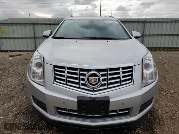 ✅ 2016 Cadillac SRX Luxury Collection • VIN: 3GYFNEE34GS575999 • Lot: 82143625. Wystawiony na Copart z przebiegiem 50 394 mil. Bezpłatny archiwum sprzedaży aukcyjnych z USA i szczegółowy raport historii pojazdu na DreamBid. Zdjęcie 5.
