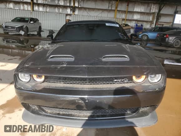 2021 Dodge Challenger SRT Hellcat с VIN 2C3CDZC9XMH601650, выставлен на аукционе Copart как лот 70405545 с пробегом 33 571 миль миль и Списание • Salvage title. История ставок и продаж доступна на DreamBid. Изображение 5.
