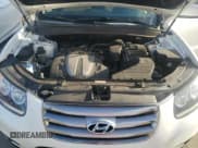 ✅ 2012 Hyundai Santa Fe Limited • VIN: 5XYZK4AG0CG104670 • Lot: 74339274. Listed on Copart with 69,102 mi. Free auction sales archive from the USA and detailed vehicle history report at DreamBid. Image 12.